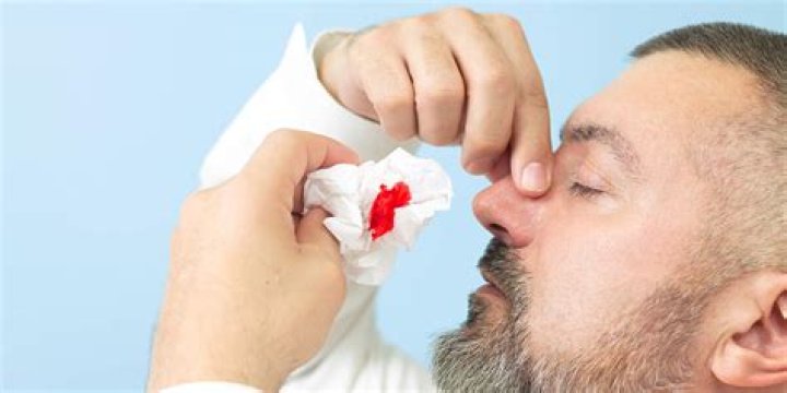 Can a bloody nose cause a false positive Covid test?