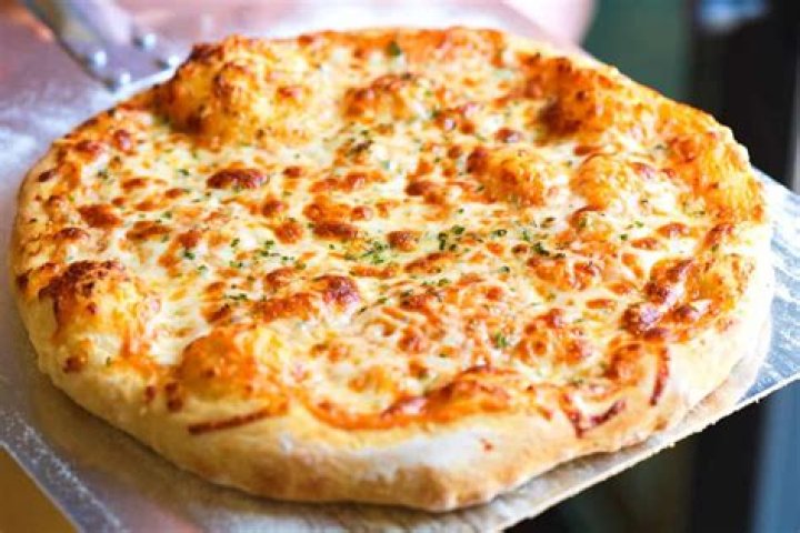 How can I spice up my cheese pizza?