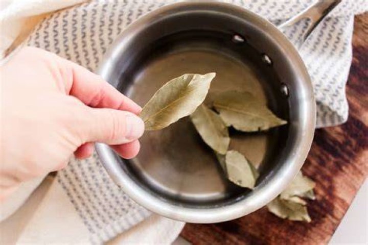 How do you apply bay leaf water to your hair?
