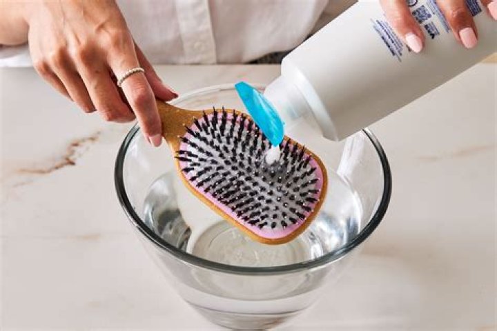 How do you sanitize a hairbrush?