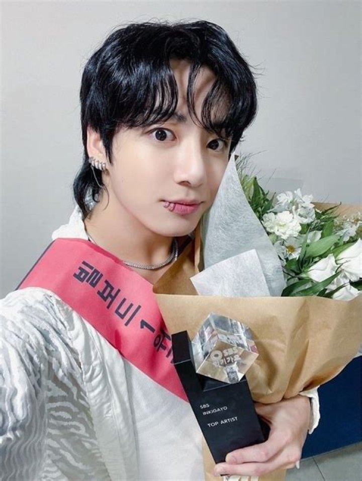How old is Jungkook?