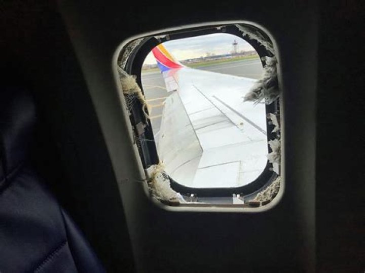 What happens if a window breaks on an airplane?