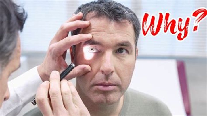 Why do doctors shine the flashlight in people's eyes?