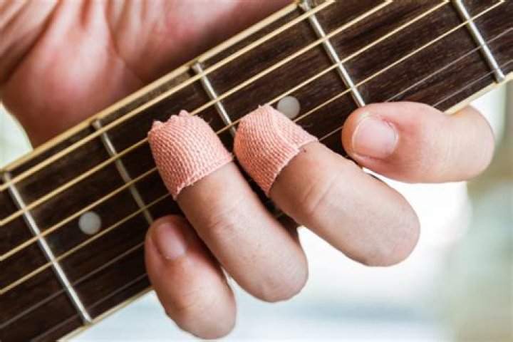 Why do guitar strings hurt my fingers?