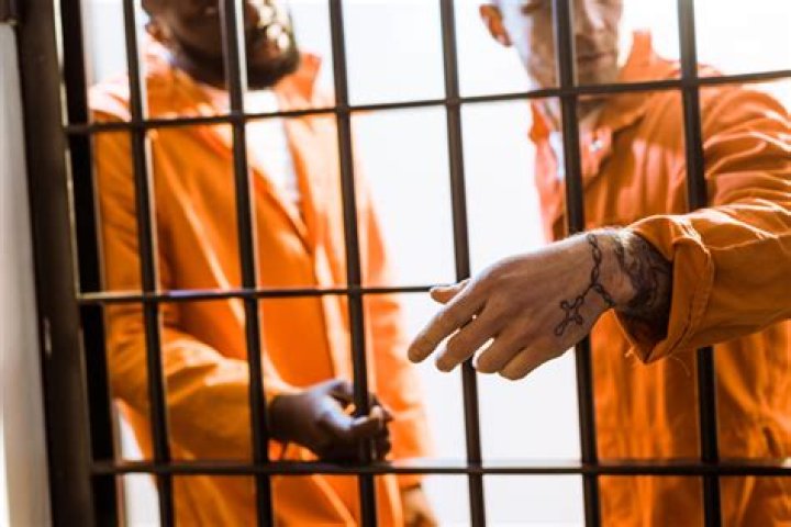 Why do prisoners wear orange?
