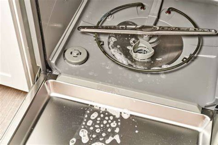 Why is the top shelf of my dishwasher not cleaning?